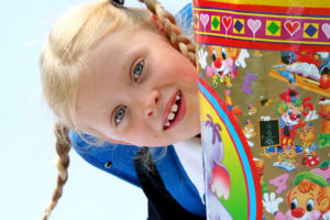Little girl with cone full of candies